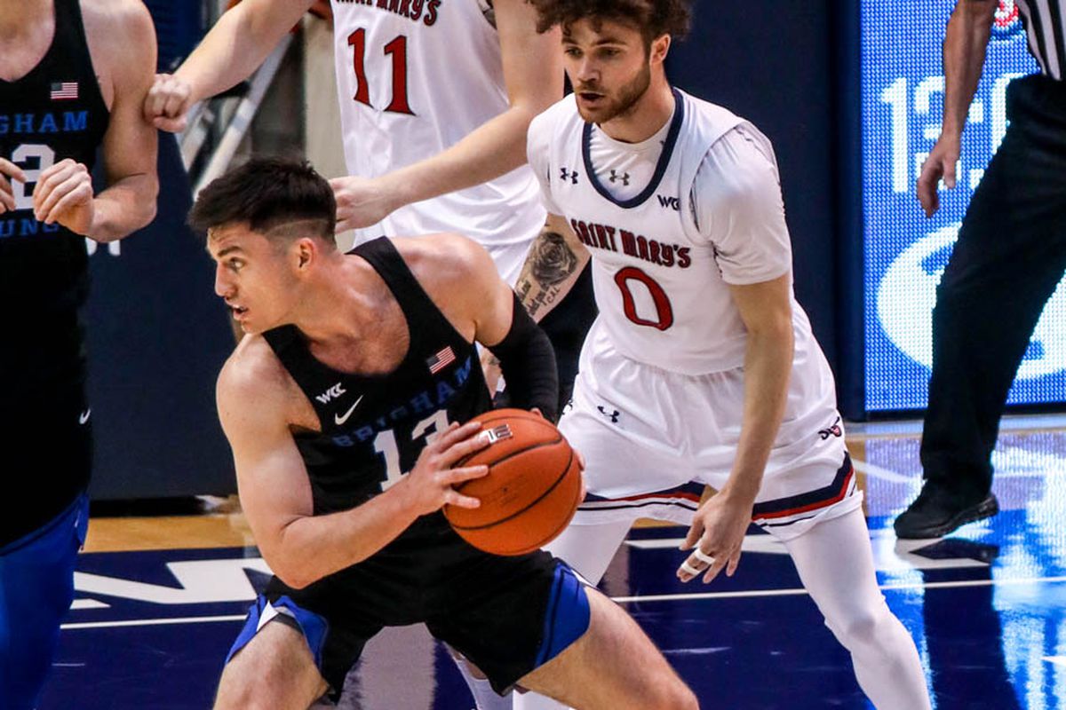 Brigham Young Cougars guard Alex Barcello (13) tries to pass the ball during a game against the Saint Mary’s Gaels in Provo on Saturday, Feb. 27, 2021.