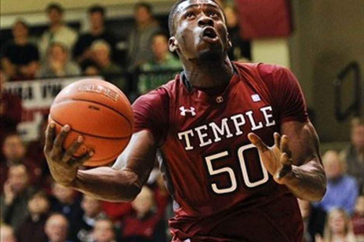 Feb 25, 2012; Philadelphia, PA, USA; Temple Owls center Micheal Eric (50) shoots during the first half against the Saint Joseph's Hawks at Hagan Arena. Mandatory Credit: Howard Smith-US PRESSWIRE