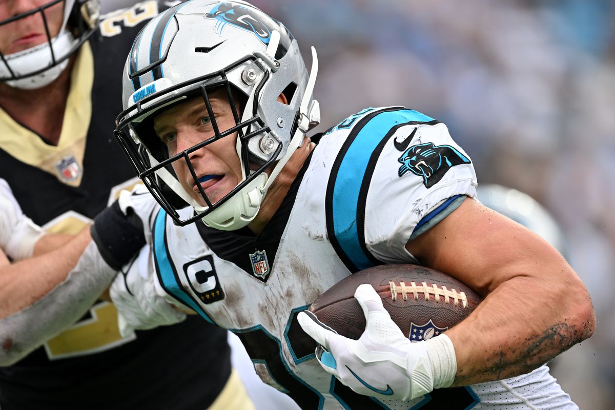 Christian McCaffrey #22 of the Carolina Panthers runs with the ball against the New Orleans Saints during the fourth quarter at Bank of America Stadium on September 25, 2022 in Charlotte, North Carolina.