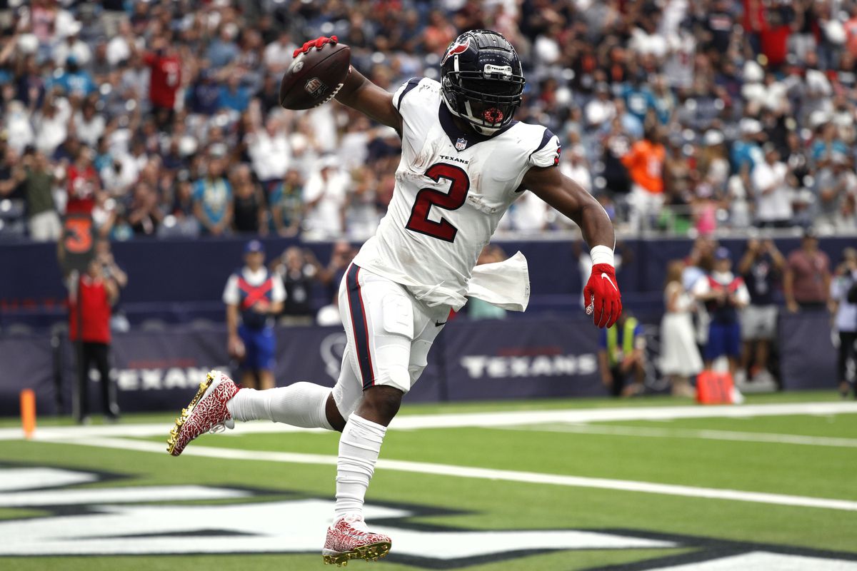 Mark Ingram #2 of the Houston Texans celebrates after a 1-yard touchdown run against the Jacksonville Jaguars during the first quarter at NRG Stadium on September 12, 2021 in Houston, Texas.