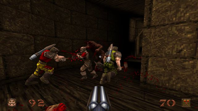 Multiple soldiers battle demons in Quake
