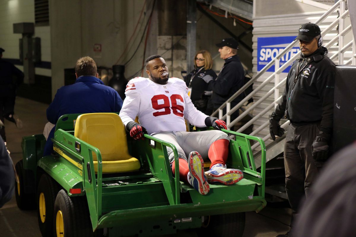 Marvin Austin is carted off the field with a torn meniscus last season against Baltimore