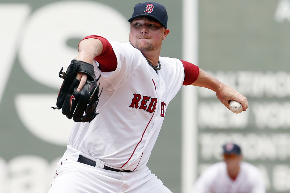 Jon Lester in a Red Sox uniform, as it was, as it always should be.