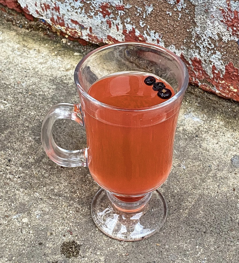 A cocktail in a tea glass. 