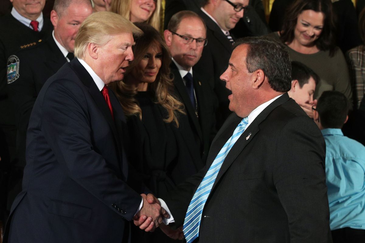 President Donald Trump and New Jersey Gov. Chris Christie shake hands during an event on the opioid crisis.