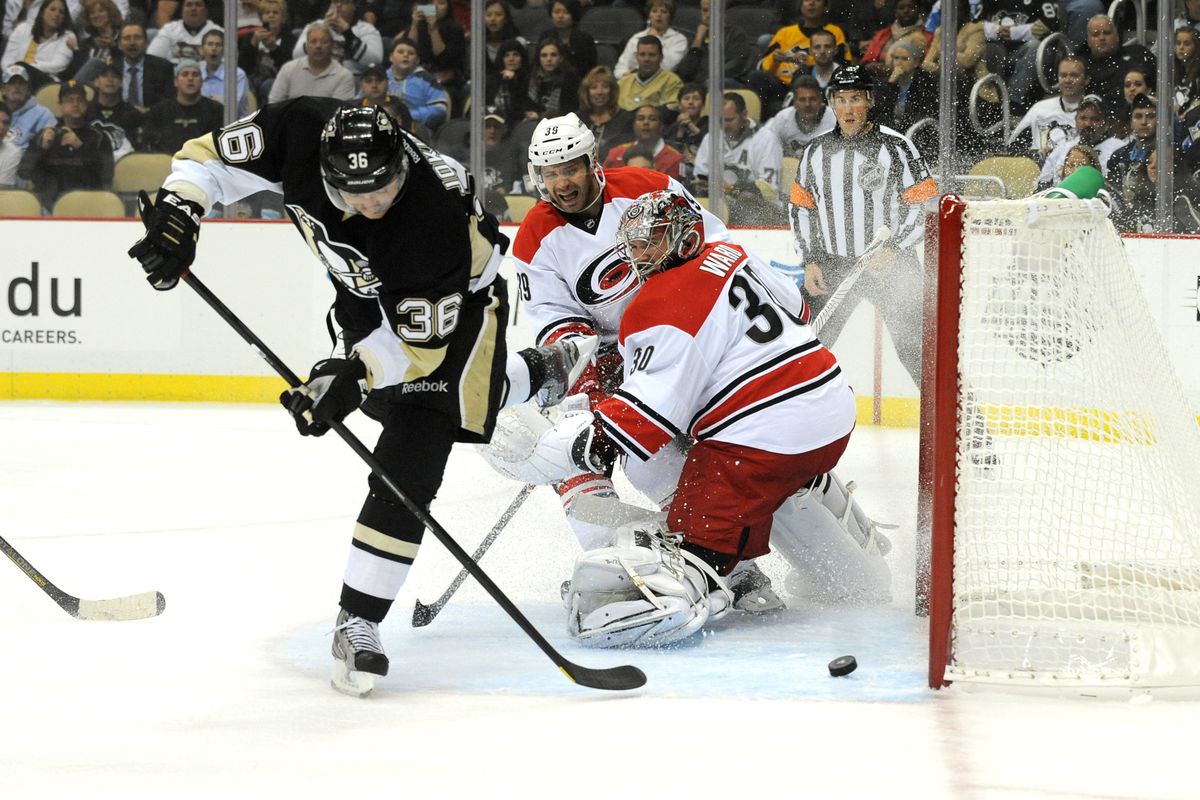 Jussi Jokinen scores the first of three goals against his former team on Tuesday night.