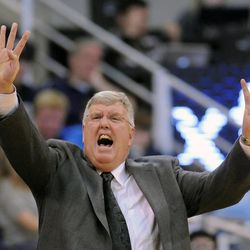 Utah State Aggies head coach Stew Morrill calls out a play during a game at EnergySolutions Arena on Saturday, November 30, 2013.