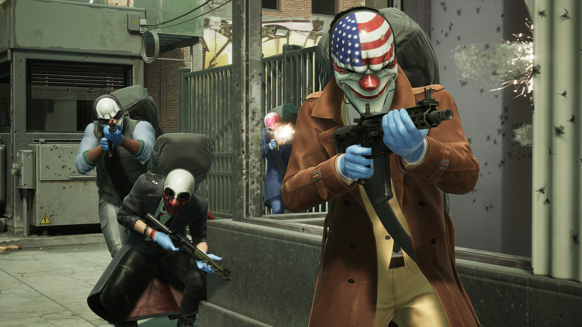 Three robbers move through a bank, wearing masks, in Payday 3