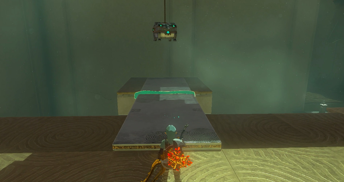 Link looking at a treasure chest hanging from the ceiling.