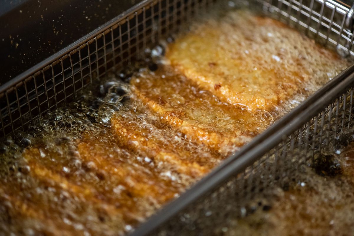 Hash browns in a fryer.
