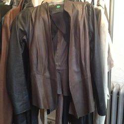 Olive green collarless open jacket with black leather sleeves and waist tie, $225 (sample)