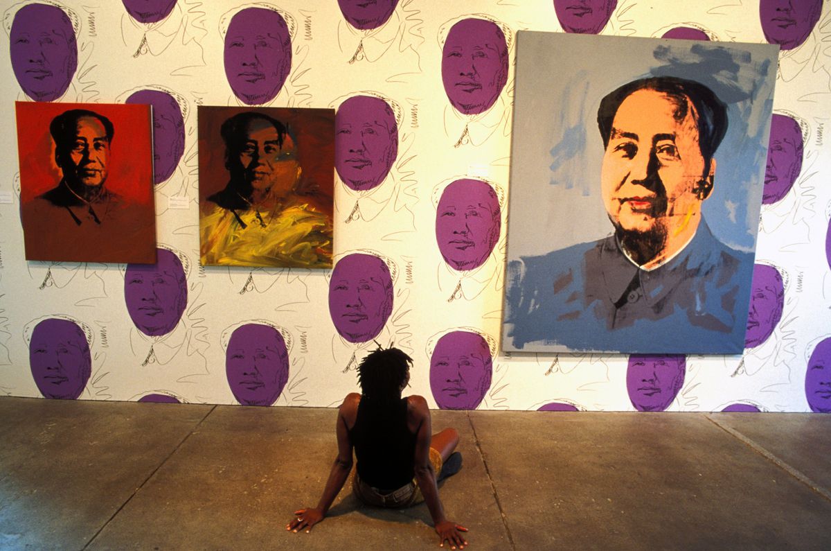 Andy Warhol Museum, Paintings Hanging, Woman Sitting On Ground
