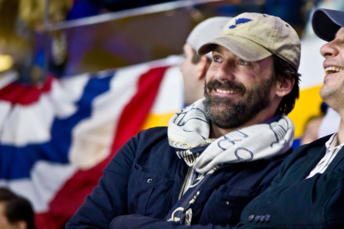 Jon Hamm at a Blues home playoff game sporting the same hat he wore in promotional videos in 2009. 
