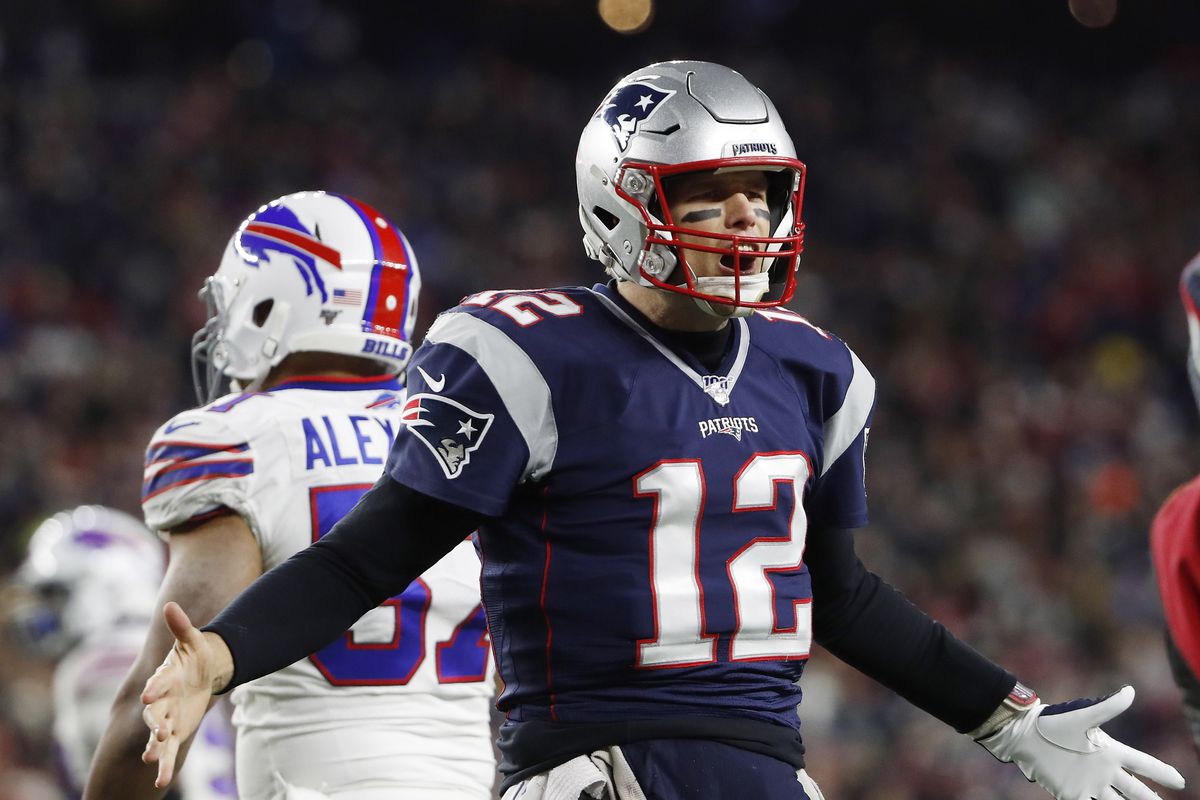 New England Patriots quarterback Tom Brady celebrates a touchdown against the Buffalo Bills during the first quarter at Gillette Stadium.
