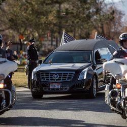 The funeral procession arrives for the graveside service for West Valley police officer Cody Brotherson at Valley View Memorial Park in West Valley City on Monday, Nov. 14, 2016.