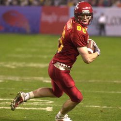 Chris Anthony #86 of Iowa State turns to the end zone after making this catch to score his second touchdown of the game against Pittsburgh during the second quarter of the Insight.com Bowl at Bank One Ballpark in Phoenix, Arizona.