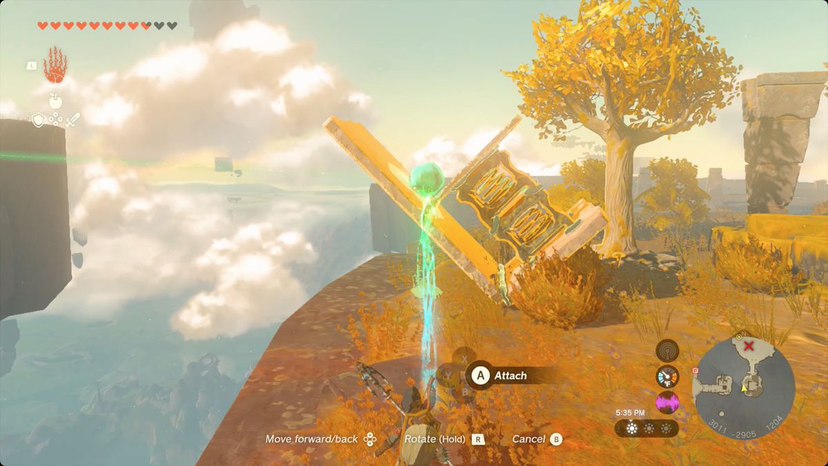 The Legend of Zelda: Tears of the Kingdom Link using Ultrahand to place the East Necluda sky crystal on a spring-driven launcher