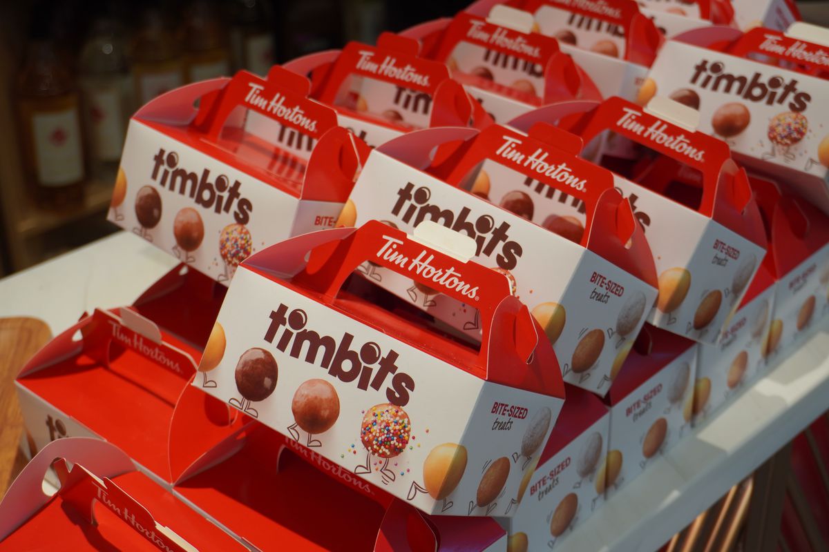 A row of Timbits boxes from Canadian chain Tim Hortons.