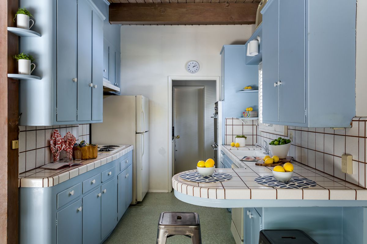 Kitchen with blue cabinets