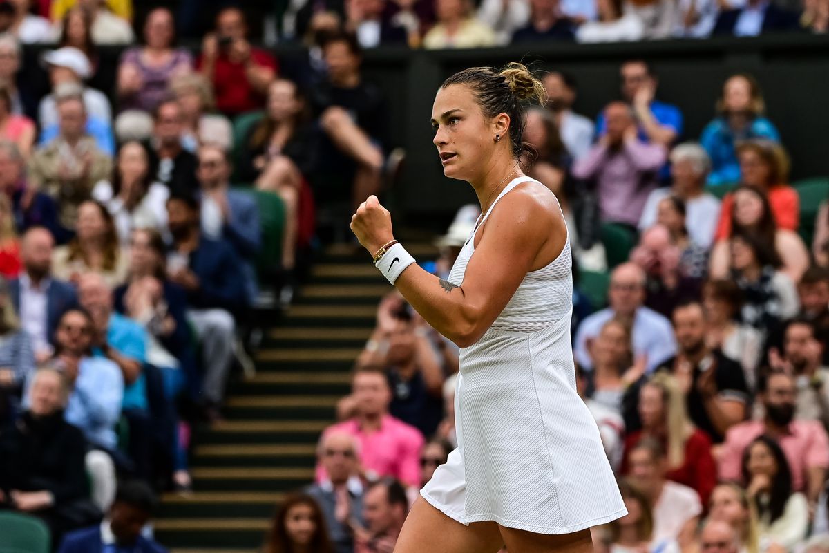 Aryna Sabalenka of Belarus celebrates during her match against Ons Jabeur of Tunisia in the quarter finals of the ladies singles during Day Eight of The Championships - Wimbledon 2021 at All England Lawn Tennis and Croquet Club on July 06, 2021 in London, England.