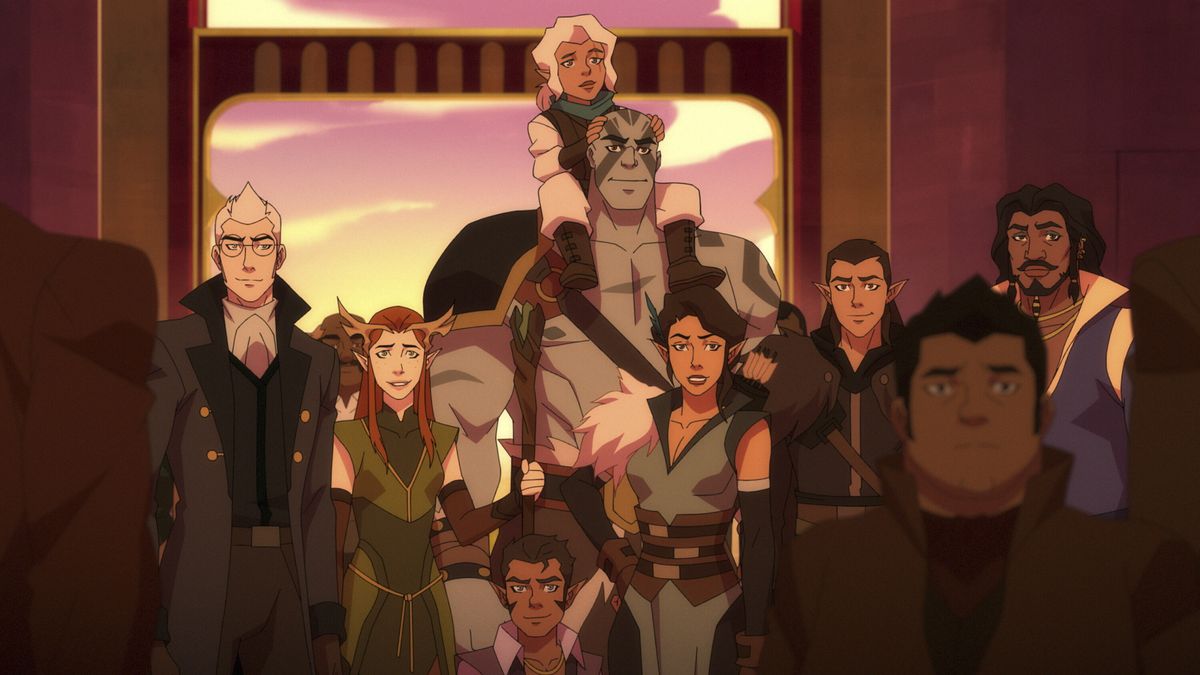 a pale haired aloof human; a redheaded half-elf; a tiny gnome man; a tall, strong goliath with a small gnome woman perched on his shoulders; a grinning half-elf woman; a smirking half-elf man; and a smiling dark-haired human stand in a large crowd