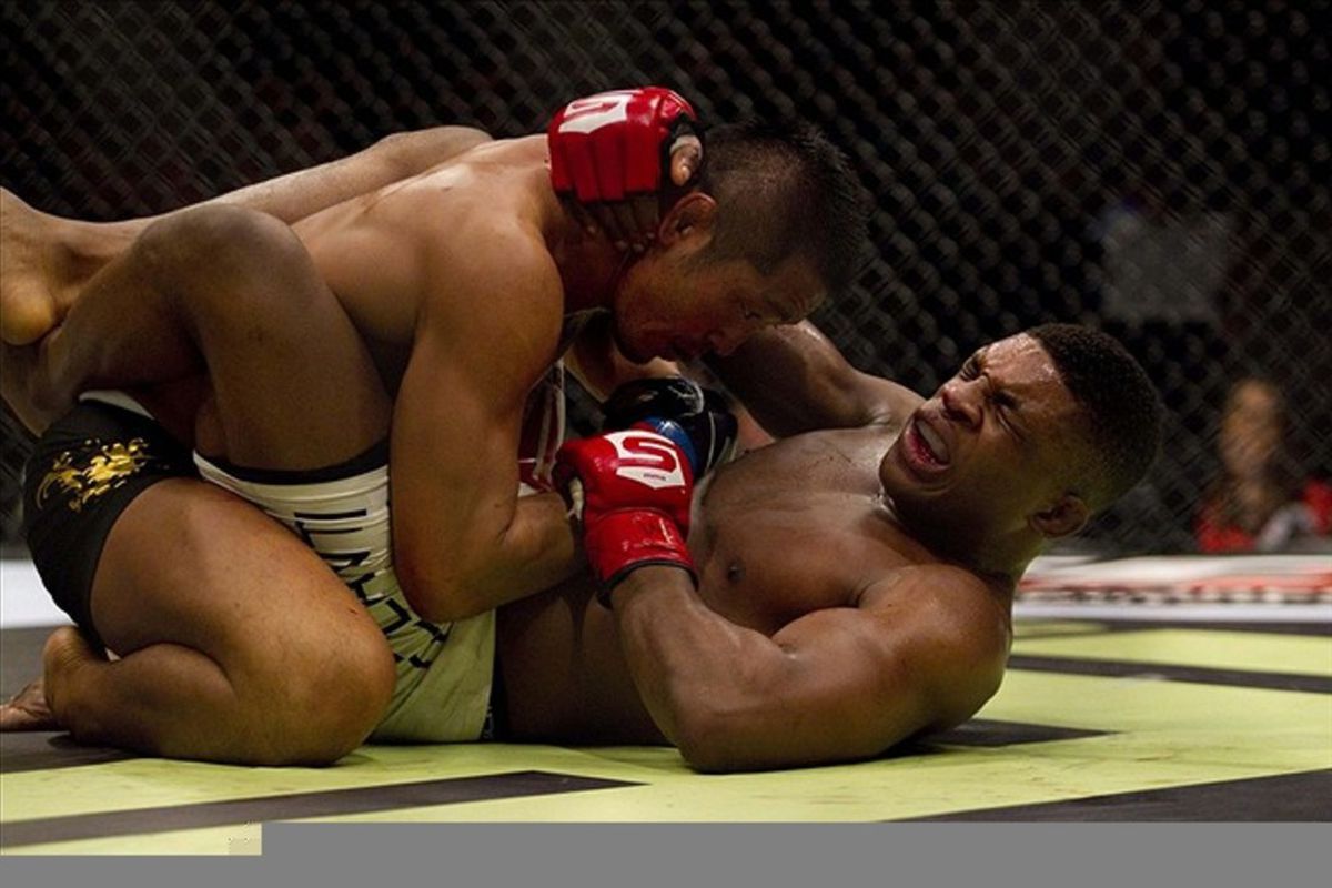 March 3, 2012; Columbus, OH, USA; Paul Daley reacts after a shot by Kazuo Misaki during the Strikeforce Grand Prix final at Nationwide Arena. . Mandatory Credit: Greg Bartram-US PRESSWIRE