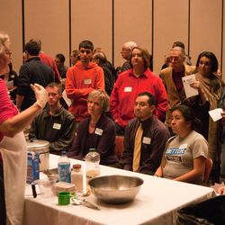 Leslie Dorius-Jones, left, demonstrates how to make matzo ball soup during last year's special Interfaith Month event, "Cooking Together: Traditional Jewish & Muslim Cuisine."