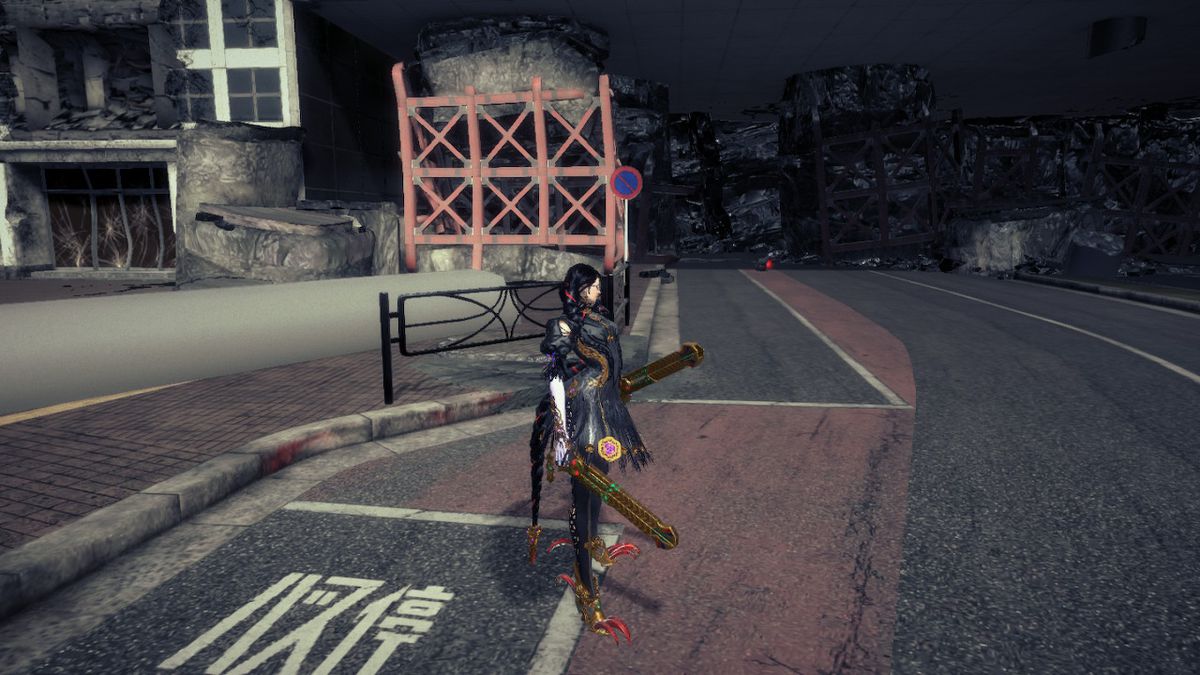 Bayonetta stands on road in front of a red metal grid