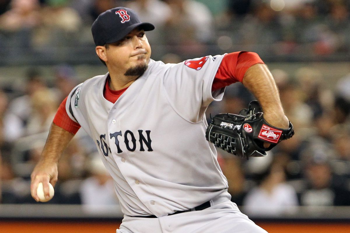 Aug 19, 2012; Bronx, NY, USA;  Boston Red Sox starting pitcher Josh Beckett (19) pitches during the first inning against the New York Yankees at Yankee Stadium. Mandatory Credit: Anthony Gruppuso-US PRESSWIRE