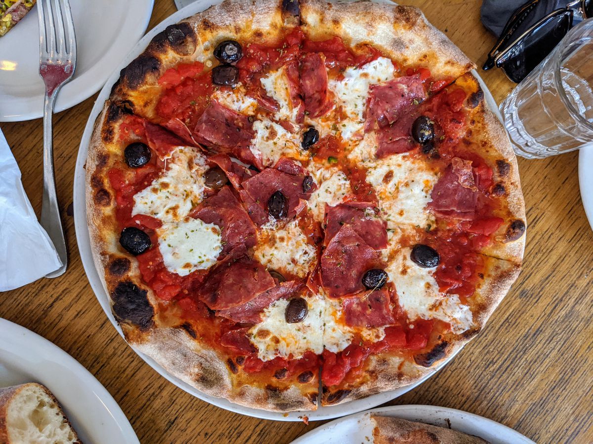 Salami and gaeta olive pizza at Pizzeria Bianco in Phoenix on a plate.