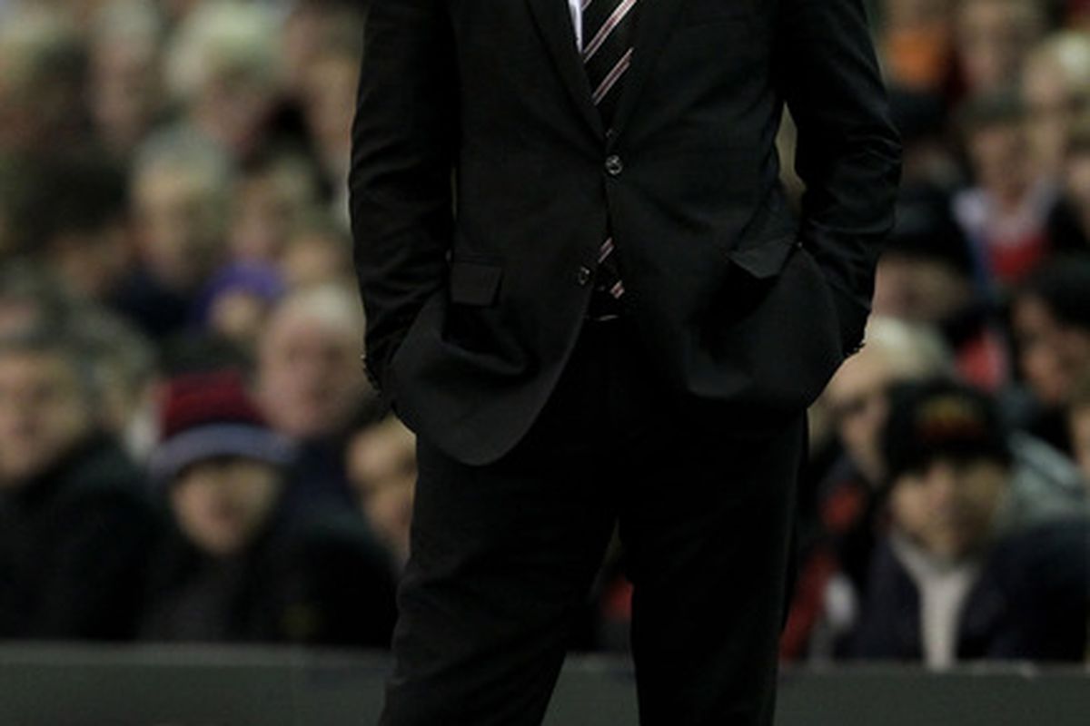 LIVERPOOL ENGLAND - JANUARY 26:  Fulham Manager Mark Hughes looks on during the Barclays Premier League match between Liverpool and Fulham at Anfield on January 26 2011 in Liverpool England. (Photo by Alex Livesey/Getty Images)