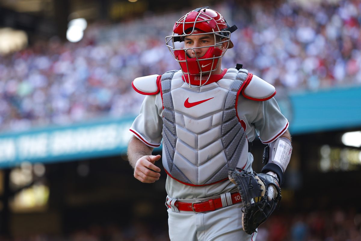 J.T. Realmuto of the Philadelphia Phillies returns to the dugout during the sixth inning against the Atlanta Braves at Truist Park on May 27, 2023 in Atlanta, Georgia.