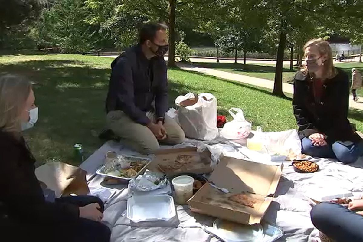Sun-Times reporter Stephanie Zimmermann (from left), ABC7 reporter Jason Knowles and Jennifer Dunn of the Northwestern-Argonne Institute of Science and Engineering having a takeout picnic to look at the amount of plastic waste even one takeout or delivery meal creates.