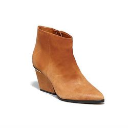 <a href="http://www1.bloomingdales.com/shop/product/boutique-9-pointed-toe-wedge-booties-isoke-low-heel">Boutique 9 booties</a>, $91.20 (was $190) 