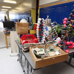 Classroom items fill the hallways at Skyline High School as work is done on the classrooms in Millcreek on Tuesday, Aug. 15, 2017.