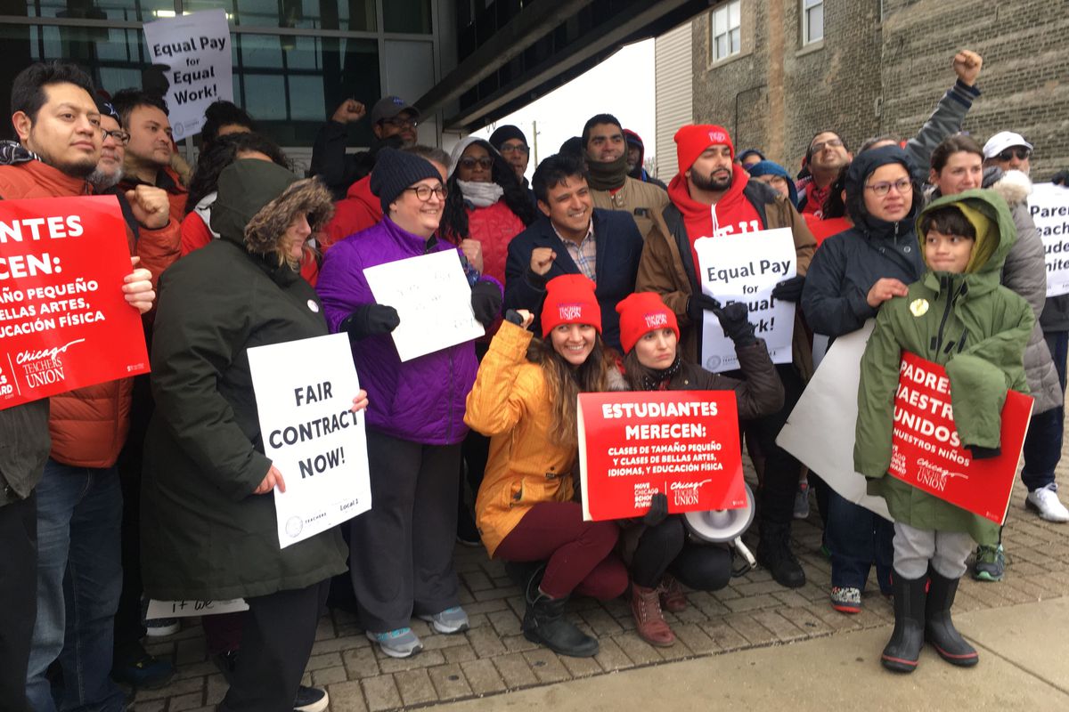 Educators from four charter and contract networks in Chicago announce the results of a strike authorization vote on April 10, 2019.