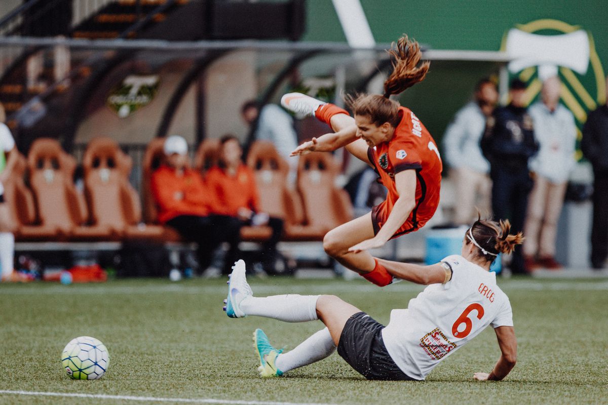 Tobin Heath is upended by Flash defender Abby Erceg during the NWSL Semifinal on October 2, 2016