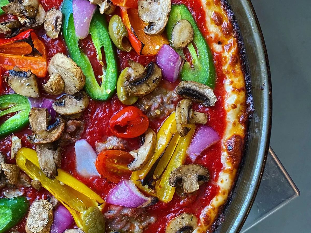 A pizza in a pan.