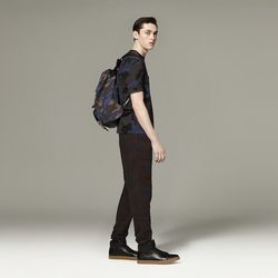 Tee in Camo Print, $19.99; French Terry Sweatpant in Camo Print, $29.99; Backpack in Camo Print, $29.99; High Top Sneaker in Black, $44.99