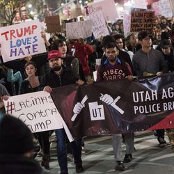 Protestors march on State Street during an anti-Trump protest in Salt Lake City on Thursday, Nov. 10, 2016. Hundreds of protestors took to the streets to denounce the president-elect, ultimately making their way to the state Capitol.