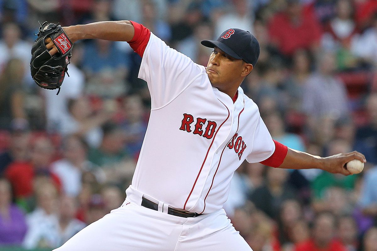 BOSTON, MA :  Felix Doubront #61 of the Boston Red Sox throws against the Cleveland Indians at Fenway Park in Boston, Massachusetts. (Photo by Jim Rogash/Getty Images)
