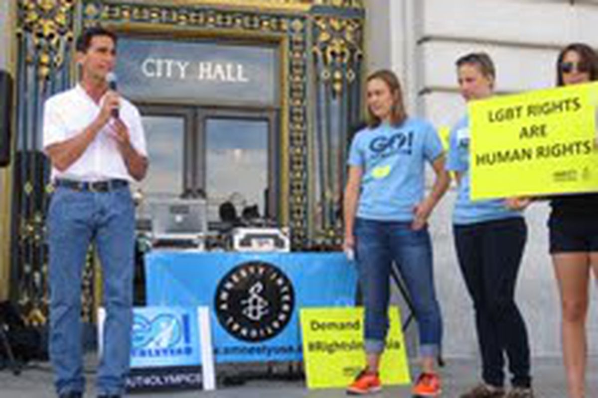 Activists and athletes rally at San Francisco City Hall to protest Russian treatment of LGBT peopel