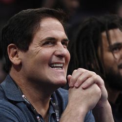 FILE - In this Saturday, Feb. 17, 2018 file photo, Dallas Mavericks owner Mark Cuban looks on from the crowd during NBA All-Star Saturday in Los Angeles. The NBA has fined outspoken Dallas Mavericks owner Mark Cuban $600,000 for comments about tanking during a podcast with Hall of Famer Julius Erving. Commissioner Adam Silver said the fine was for "public statements detrimental to the NBA."