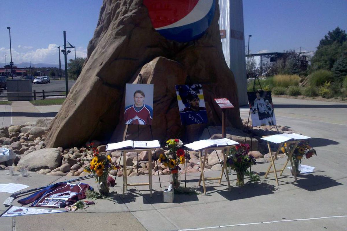 Memorial site for former Avalanche players Karlis Skrastins, Ruslan Salei and Wade Belak. September 10, 2011. Pepsi Center, Denver, CO.
