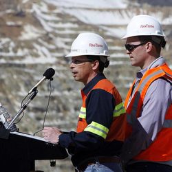 Kelly Sanders, front, president and CEO of Rio Tinto's Kennecott Utah Copper, speaks to the media during a tour of the Bingham Canyon Mine on Thursday, April 25, 2013. At right is Salt Lake County Mayor Ben McAdams.