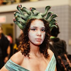 Medusa: Use silver cream eyeshadow or body paint to draw reptilian scales all over the face, then add an exaggerated cat-eye.