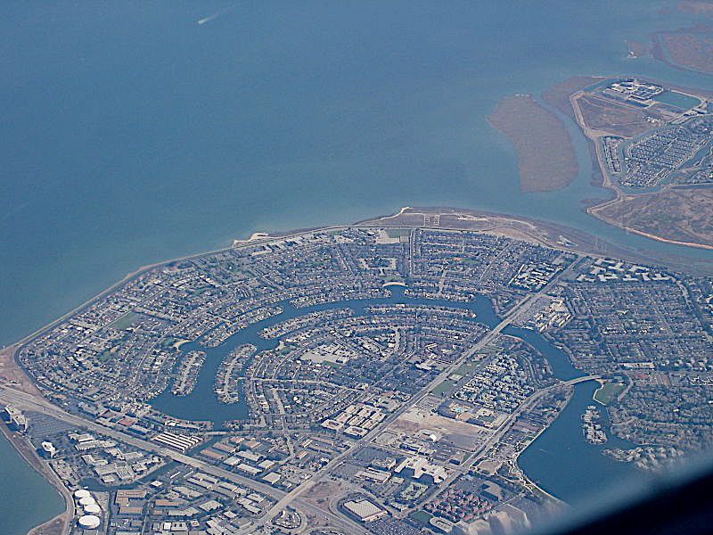 An aerial view of a city surrounded by water. The city is Foster City in California.