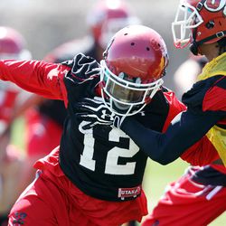 Justin Thomas practices with the University of Utah football team in Salt Lake City, Thursday, April 18, 2013.