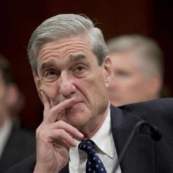 FBI Director Robert Mueller listens on Capitol Hill in Washington, Thursday, April 11, 2013, during the House Intelligence Committee hearing on worldwide threats. Mueller was among intelligence agency heads who testified before the committee.  