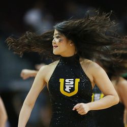 San Francisco Lady Dons cheerleaders perform during the WCC tournament championship in Las Vegas Tuesday, March 8, 2016.  San Francisco won 70-68. 